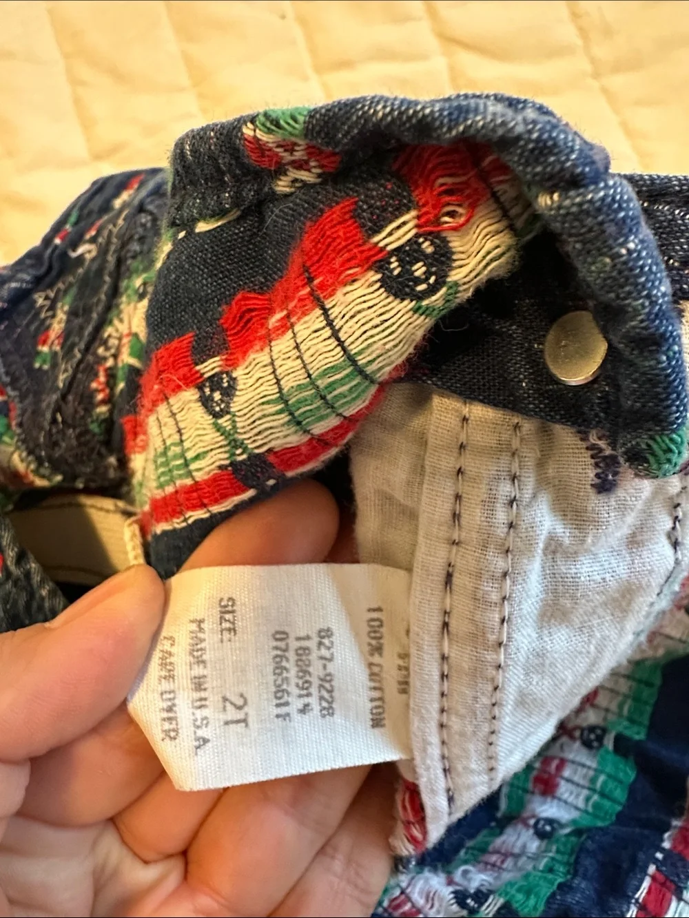 VINTAGE unisex WOshKosh B'gosh Navy Overalls with Colorful Nutcracker Print